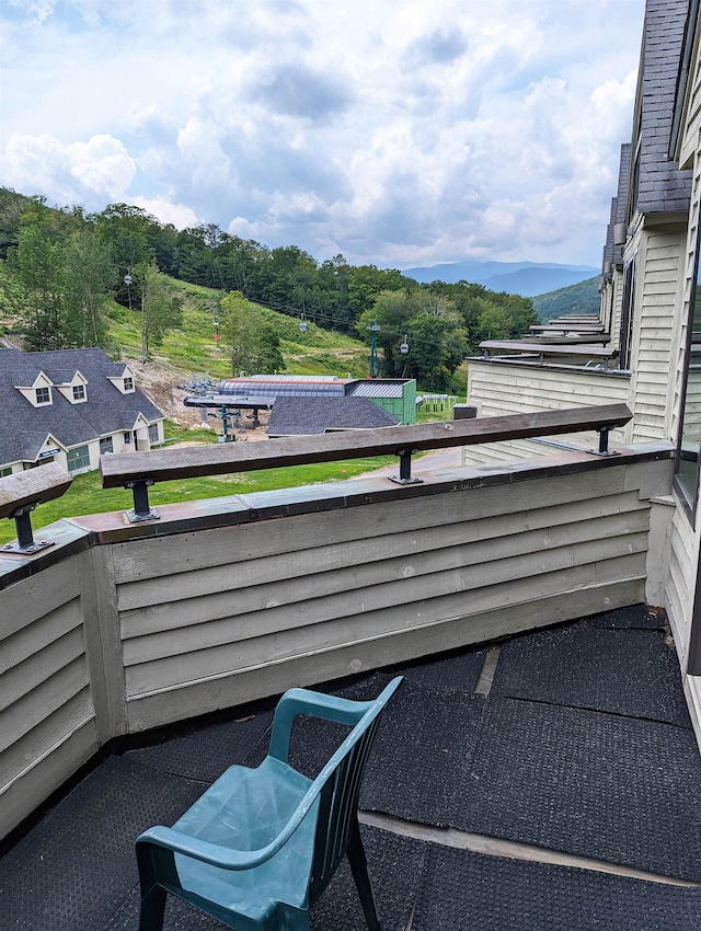 balcony featuring a mountain view