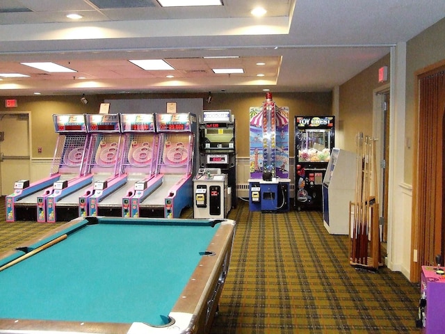 recreation room with billiards, dark carpet, and a tray ceiling