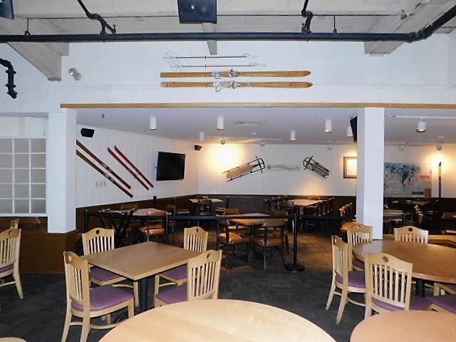 dining space with concrete flooring