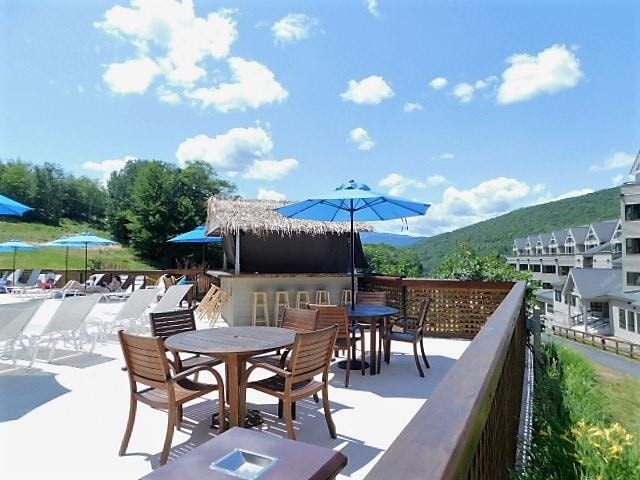 view of patio / terrace with a mountain view