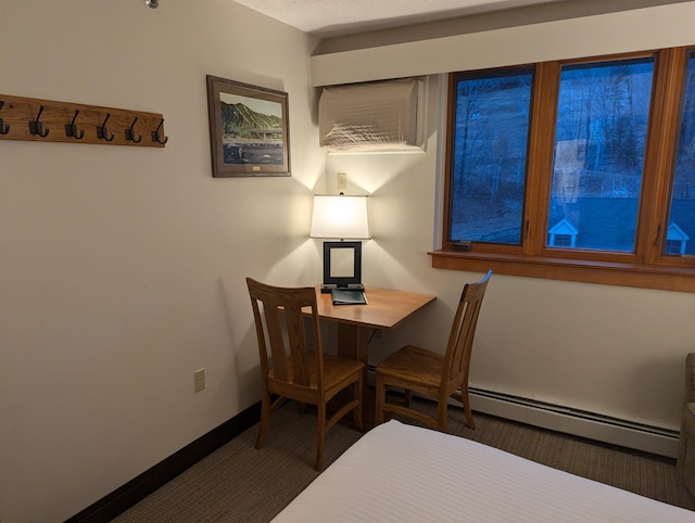 dining space featuring a baseboard radiator