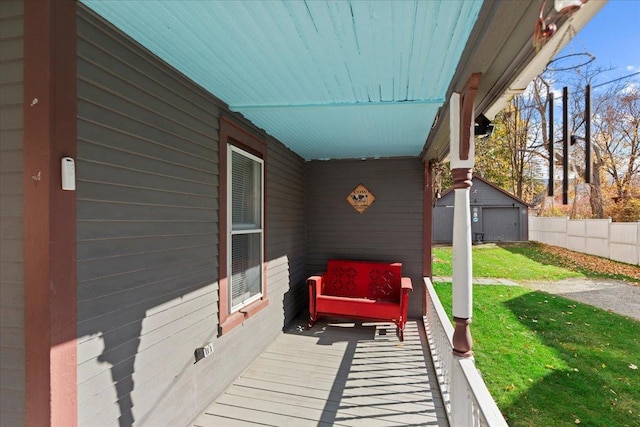 exterior space with an outbuilding and a garage