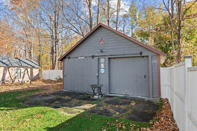 view of outdoor structure featuring a garage