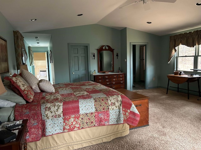 bedroom featuring carpet, ceiling fan, and lofted ceiling