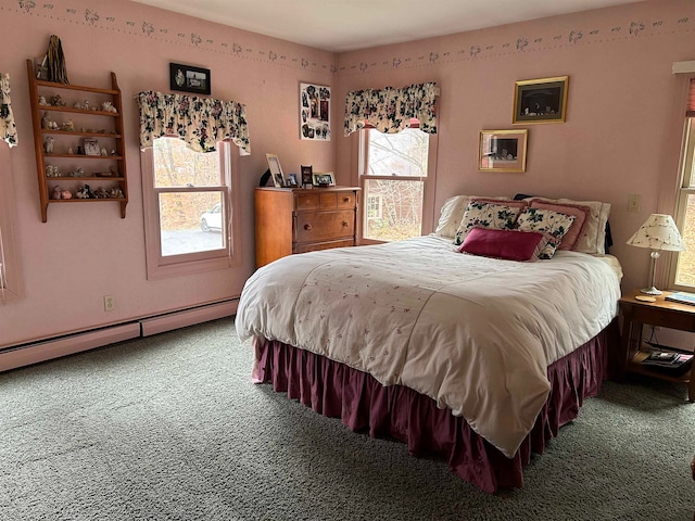 carpeted bedroom with a baseboard radiator