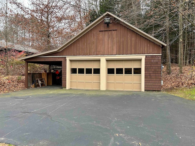 garage featuring a carport