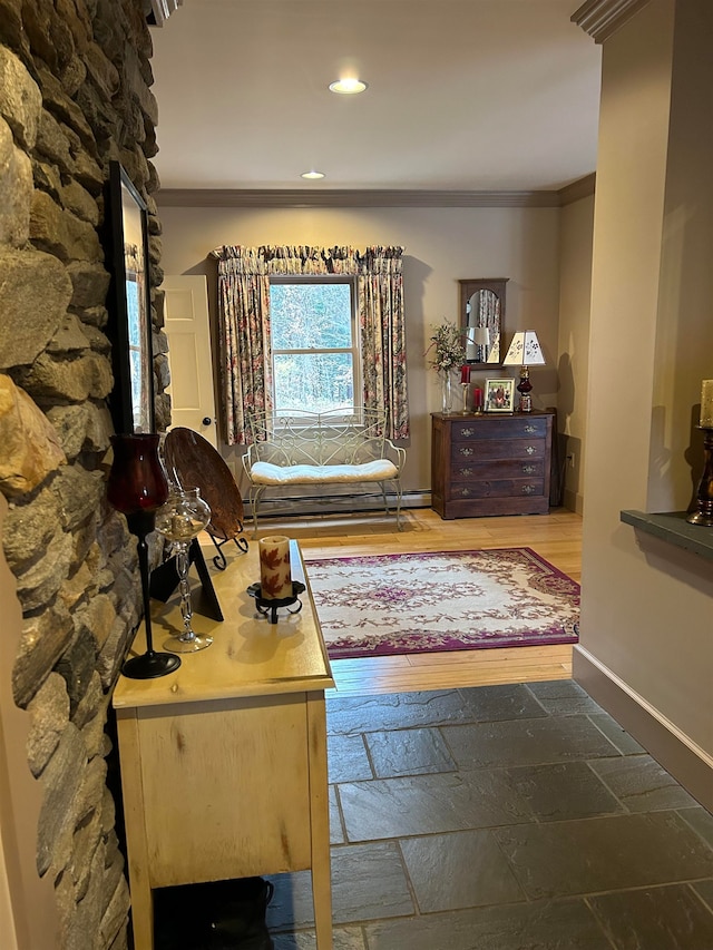 bedroom with hardwood / wood-style floors and ornamental molding