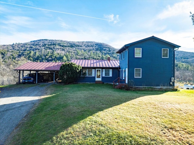 1319 Brandon Mountain Rd, Rochester, VT 05767 - view of front of house featuring a front yard, gravel driveway, entry steps, and metal roof