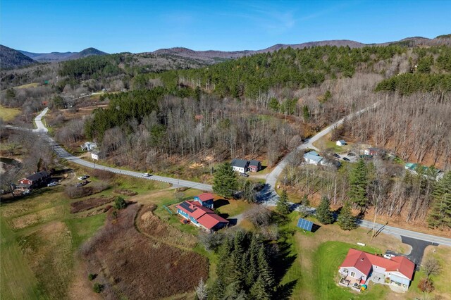 1319 Brandon Mountain Rd, Rochester, VT 05767 - aerial view of property and surrounding area with a forest and a mountain backdrop