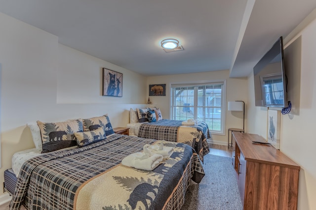 bedroom featuring hardwood / wood-style floors