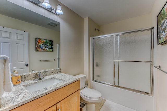 full bathroom with tile patterned flooring, vanity, toilet, and enclosed tub / shower combo