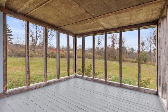 unfurnished sunroom featuring plenty of natural light