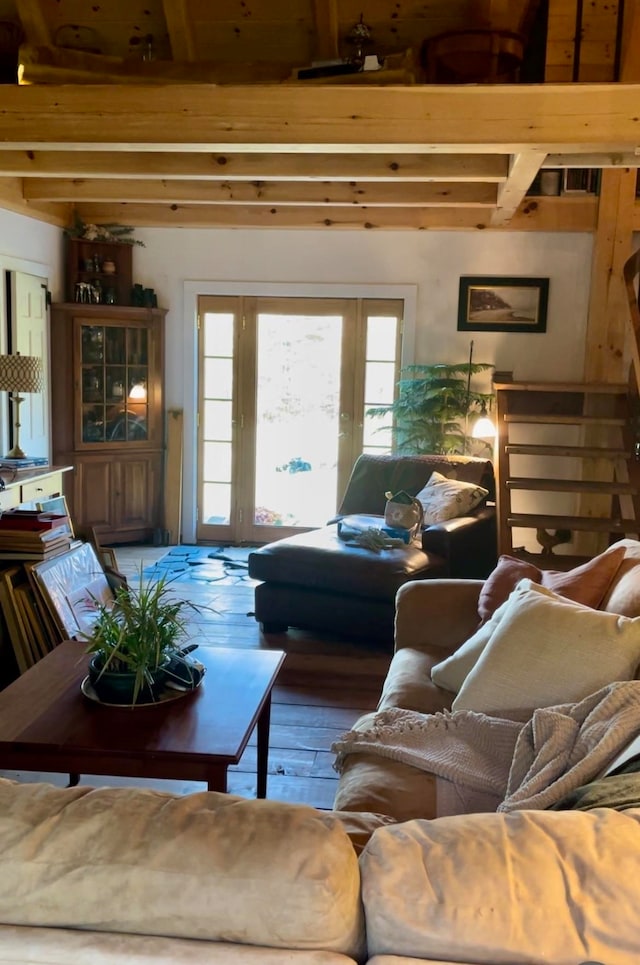 living room with hardwood / wood-style floors and beamed ceiling