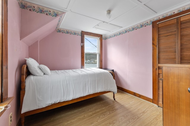 bedroom featuring hardwood / wood-style floors