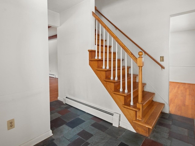 67 Case Pkwy, Burlington, VT 05401 - stairs featuring a baseboard heating unit