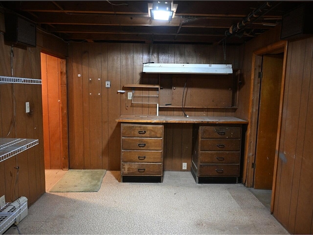67 Case Pkwy, Burlington, VT 05401 - basement featuring wood walls and a desk