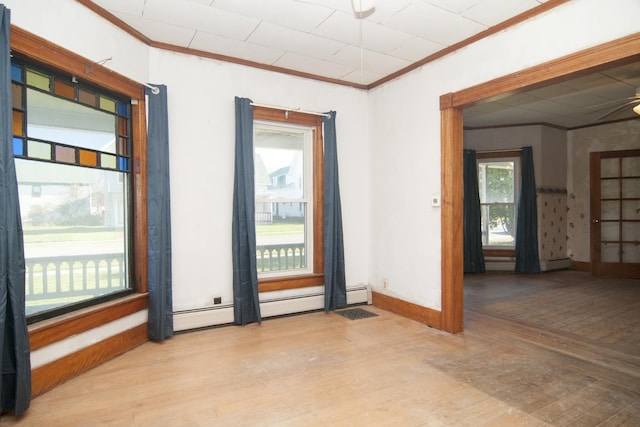 43 Maple St, Orleans, VT 06860 - unfurnished room featuring crown molding, wood finished floors, baseboards, and a ceiling fan