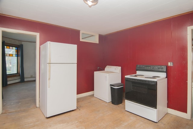 43 Maple St, Orleans, VT 06860 - kitchen with freestanding refrigerator, range with electric cooktop, washer / clothes dryer, and light wood-style floors