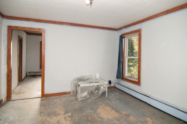 43 Maple St, Orleans, VT 06860 - unfurnished room with a baseboard radiator and unfinished concrete floors