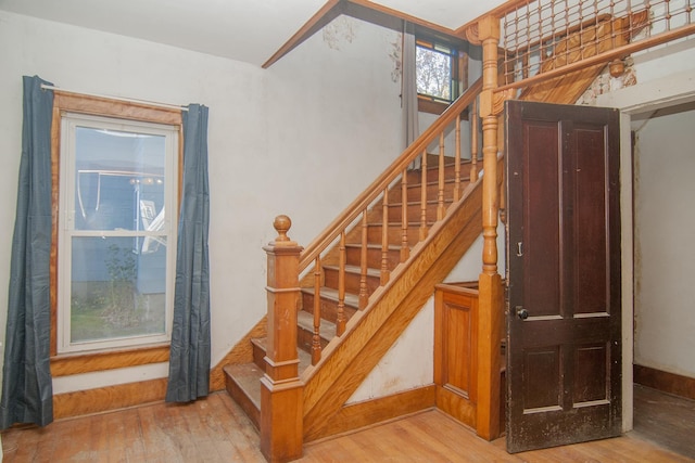 43 Maple St, Orleans, VT 06860 - staircase featuring wood finished floors and baseboards