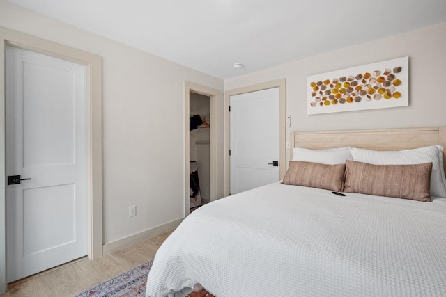 bedroom with light hardwood / wood-style floors