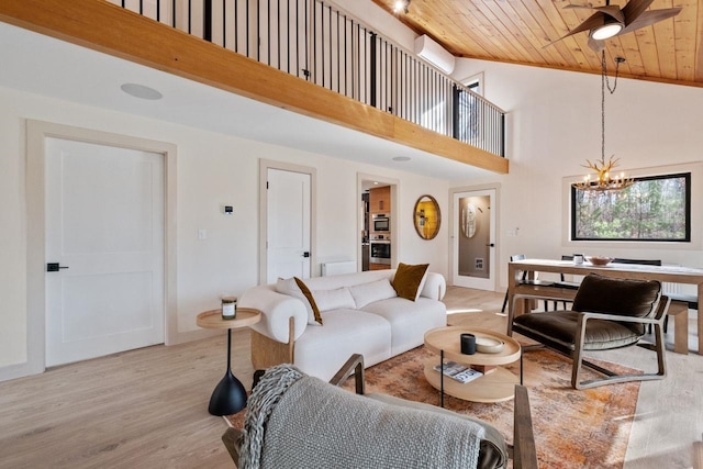 living room featuring wooden ceiling, ceiling fan with notable chandelier, light wood-type flooring, and high vaulted ceiling