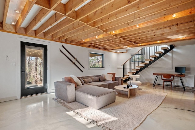 living room with concrete floors