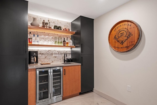 bar with beverage cooler, sink, and decorative backsplash