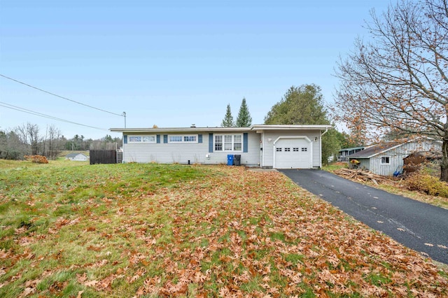 single story home with a garage