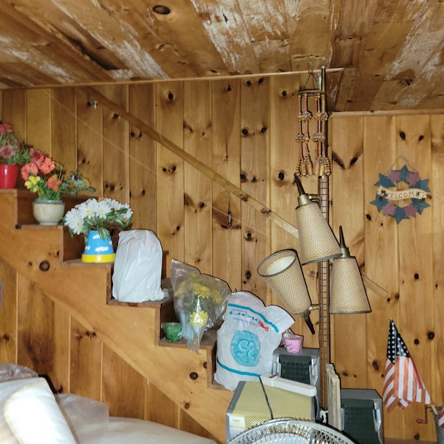 interior details featuring wood ceiling and wooden walls