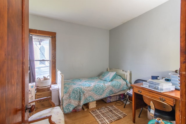 bedroom featuring wood-type flooring