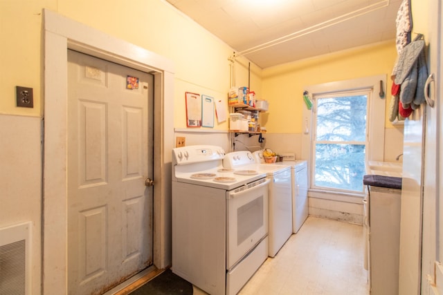 laundry room featuring washer and dryer