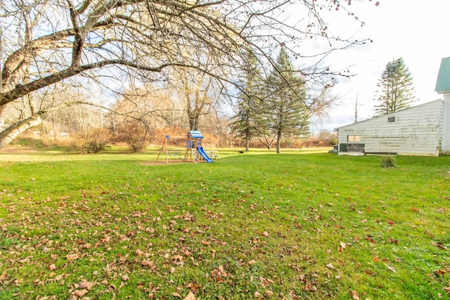 view of yard featuring a playground