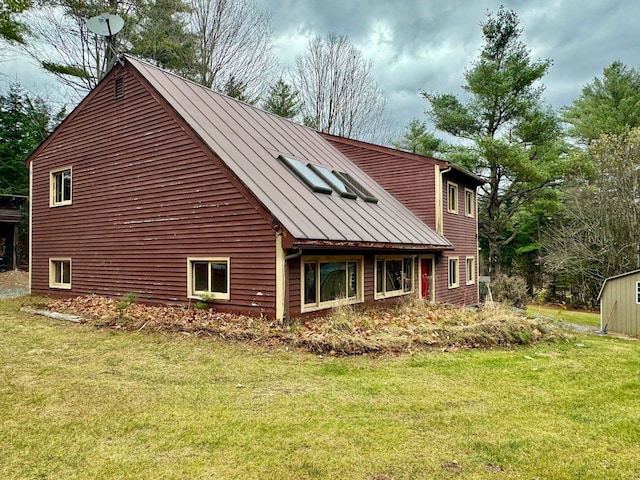 view of home's exterior featuring a lawn