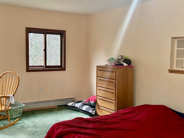 carpeted bedroom with a baseboard radiator