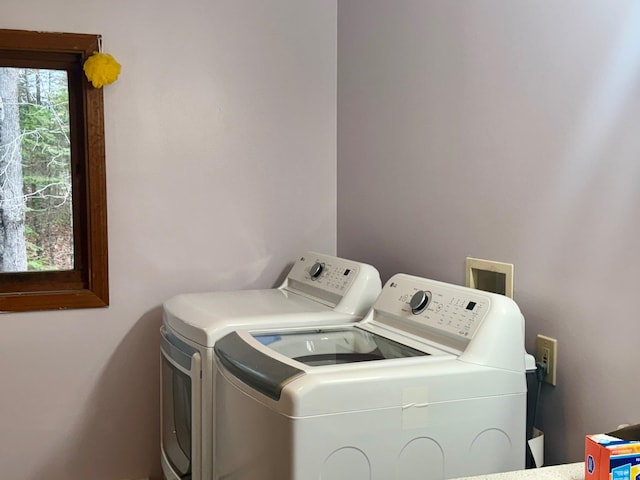 laundry room with washer and dryer