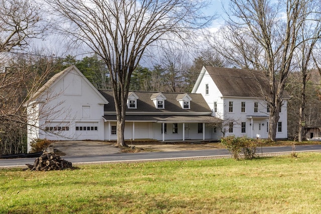 view of front of house with a porch and a front yard