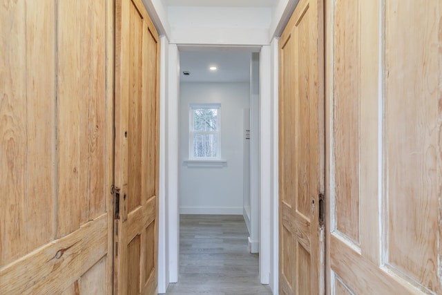 corridor featuring light wood-type flooring