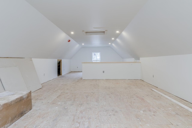 bonus room featuring vaulted ceiling