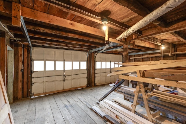 garage featuring wooden ceiling