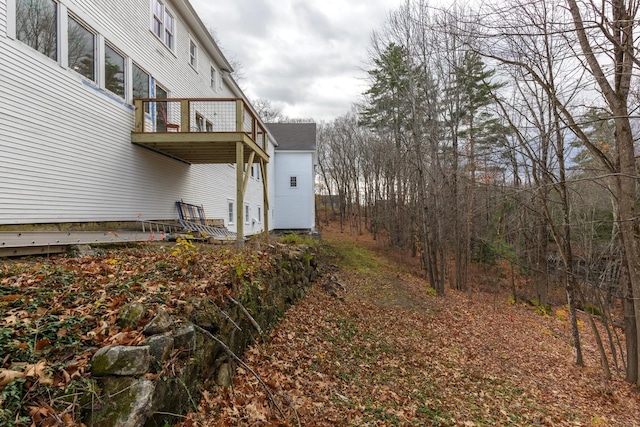 view of home's exterior featuring a balcony