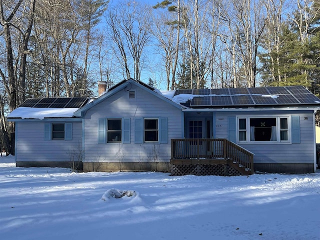 view of front of house with solar panels