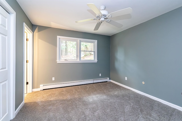 empty room featuring carpet flooring, a baseboard radiator, and ceiling fan