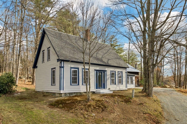 view of new england style home