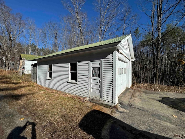 view of outdoor structure with a garage