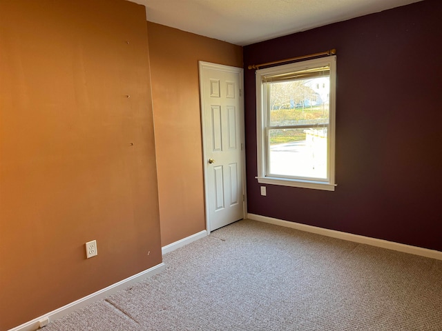 empty room with carpet floors