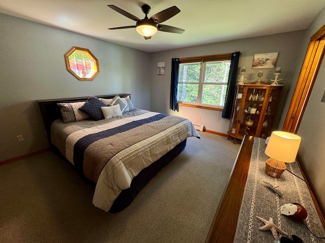 bedroom featuring carpet flooring, a baseboard heating unit, and ceiling fan