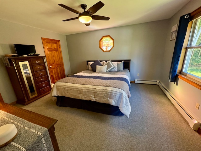 bedroom with carpet flooring, a baseboard radiator, and ceiling fan