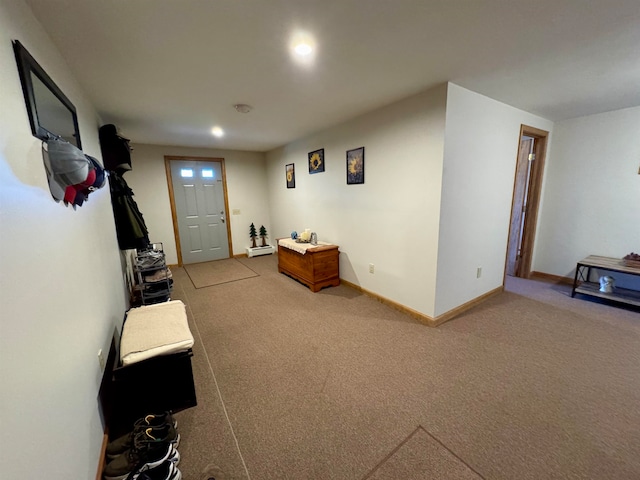 entrance foyer featuring carpet