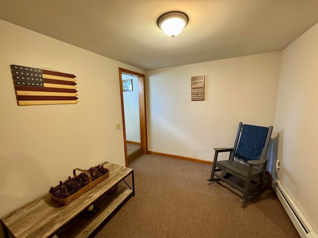 sitting room with a baseboard radiator and carpet floors